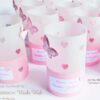 Windlichthüllen Tischlicht-Hüllen für Teelichter mit 3D-Schmetterling und personalisiertem Text auf unterem Papierstreifen in rosa. Handgefertigt aus 115g Transparentpapier. Hüllen mit gestanzten Herzen. © KARTEN-DESIGN.at